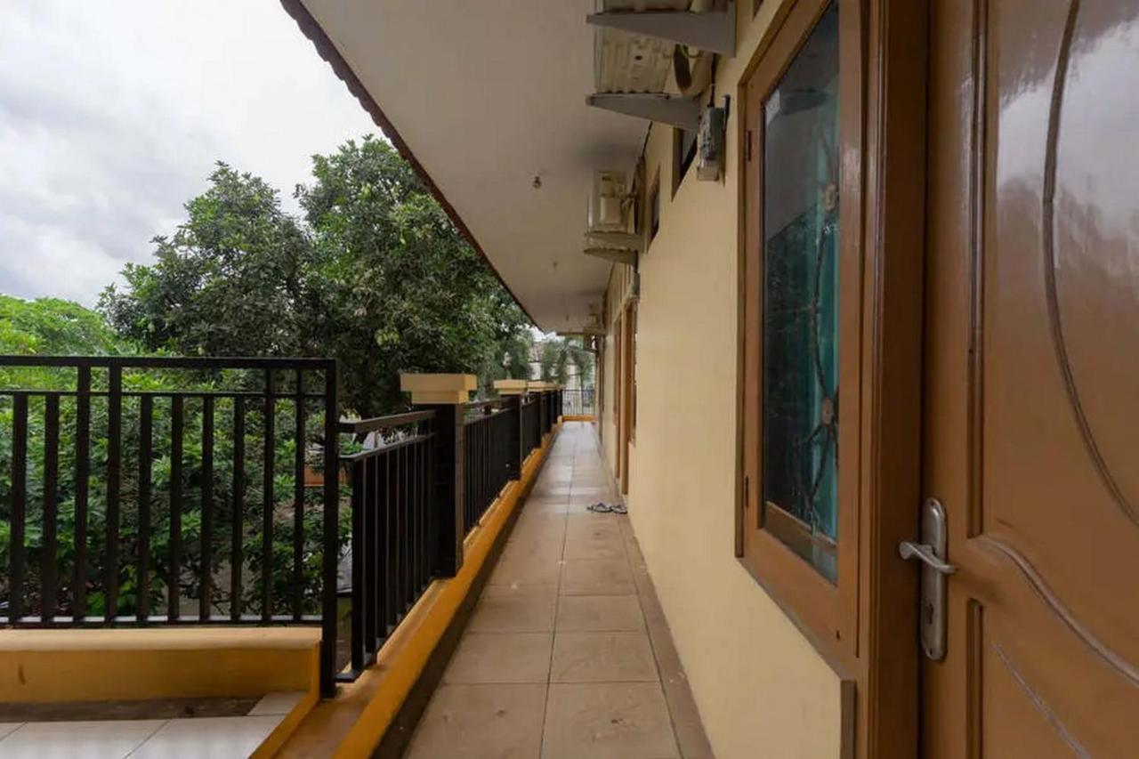 Hotel Kostawira Syariah Bintaro Mitra Reddoorz Mencil Exterior foto